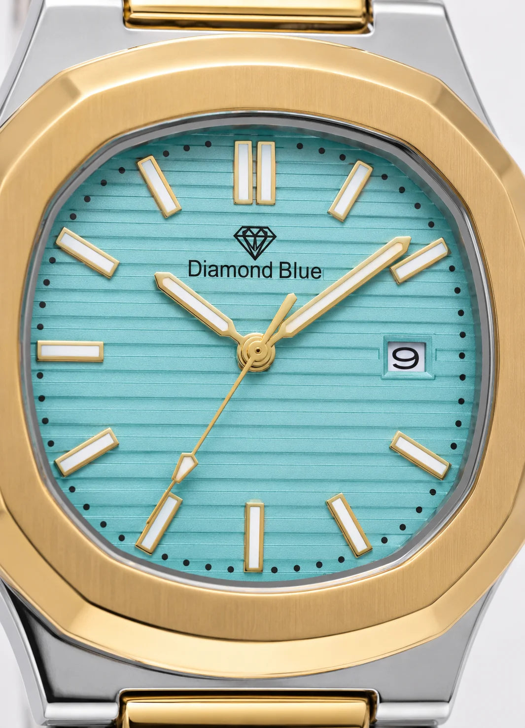 Close-up of the Diamond Blue DB-004 Tiffany blue textured dial featuring gold-tone hour markers, date display, and Japanese quartz movement.

Detailed close-up of the Diamond Blue DB-004 Tiffany blue dial, showcasing refined craftsmanship, gold-tone accents, and elegant executive styling.