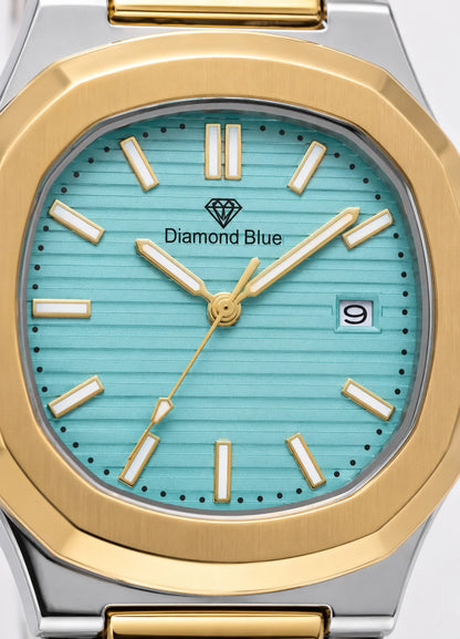Close-up of the Diamond Blue DB-004 Tiffany blue textured dial featuring gold-tone hour markers, date display, and Japanese quartz movement.

Detailed close-up of the Diamond Blue DB-004 Tiffany blue dial, showcasing refined craftsmanship, gold-tone accents, and elegant executive styling.