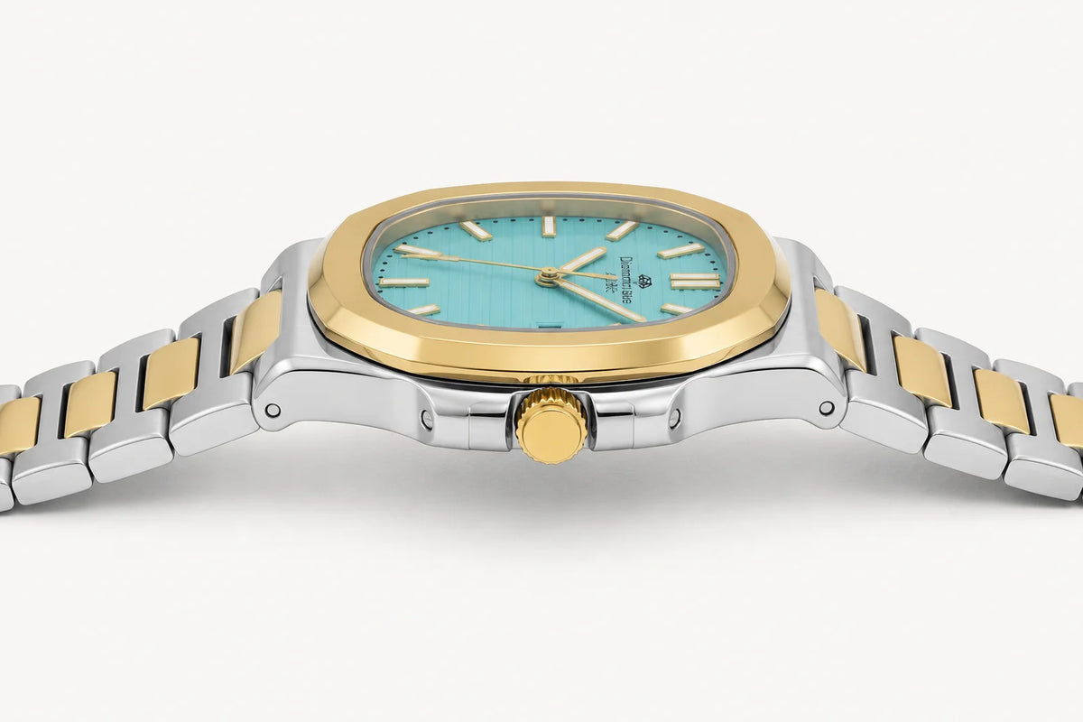 Side profile of the Diamond Blue DB-004 men's luxury watch showing the slim stainless steel case, gold crown, integrated bracelet, and premium finishing.

Diamond Blue DB-004 side profile displaying its slim executive case, premium finishing, and integrated bracelet.