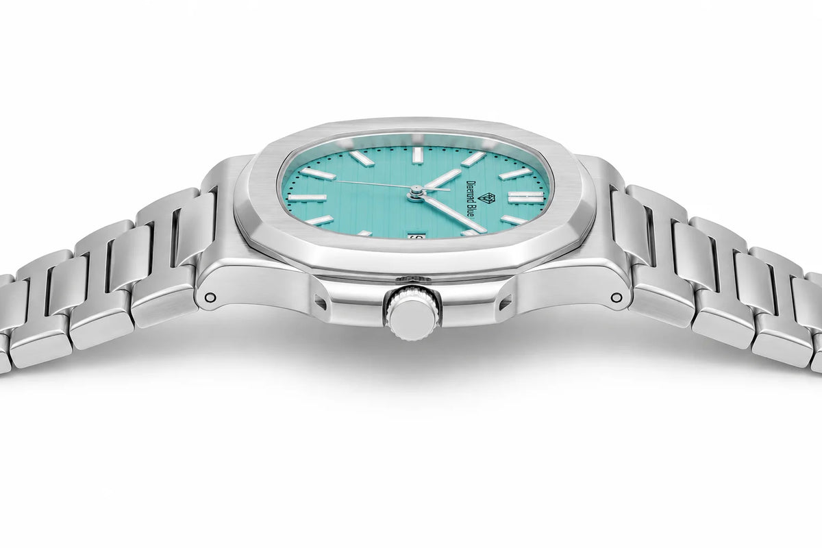 Side profile of Diamond Blue DB-005 stainless steel luxury men's watch showing slim case and integrated bracelet.