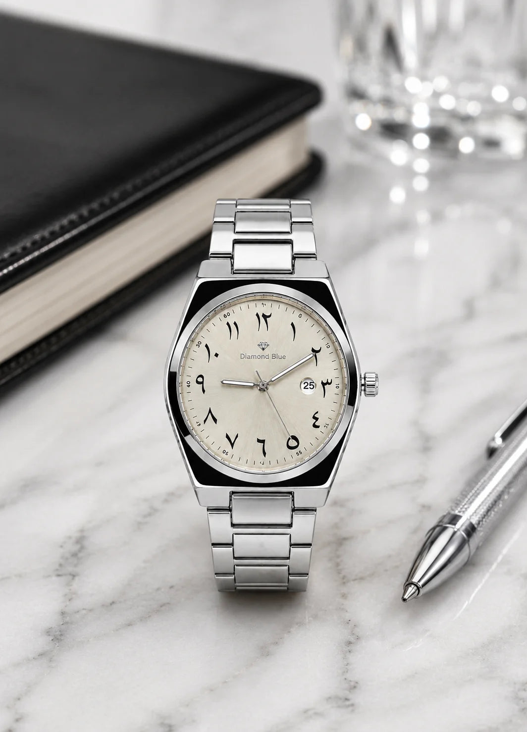 Diamond Blue DB-011 luxury men's silver watch with ivory Arabic numeral dial displayed on a premium marble surface.