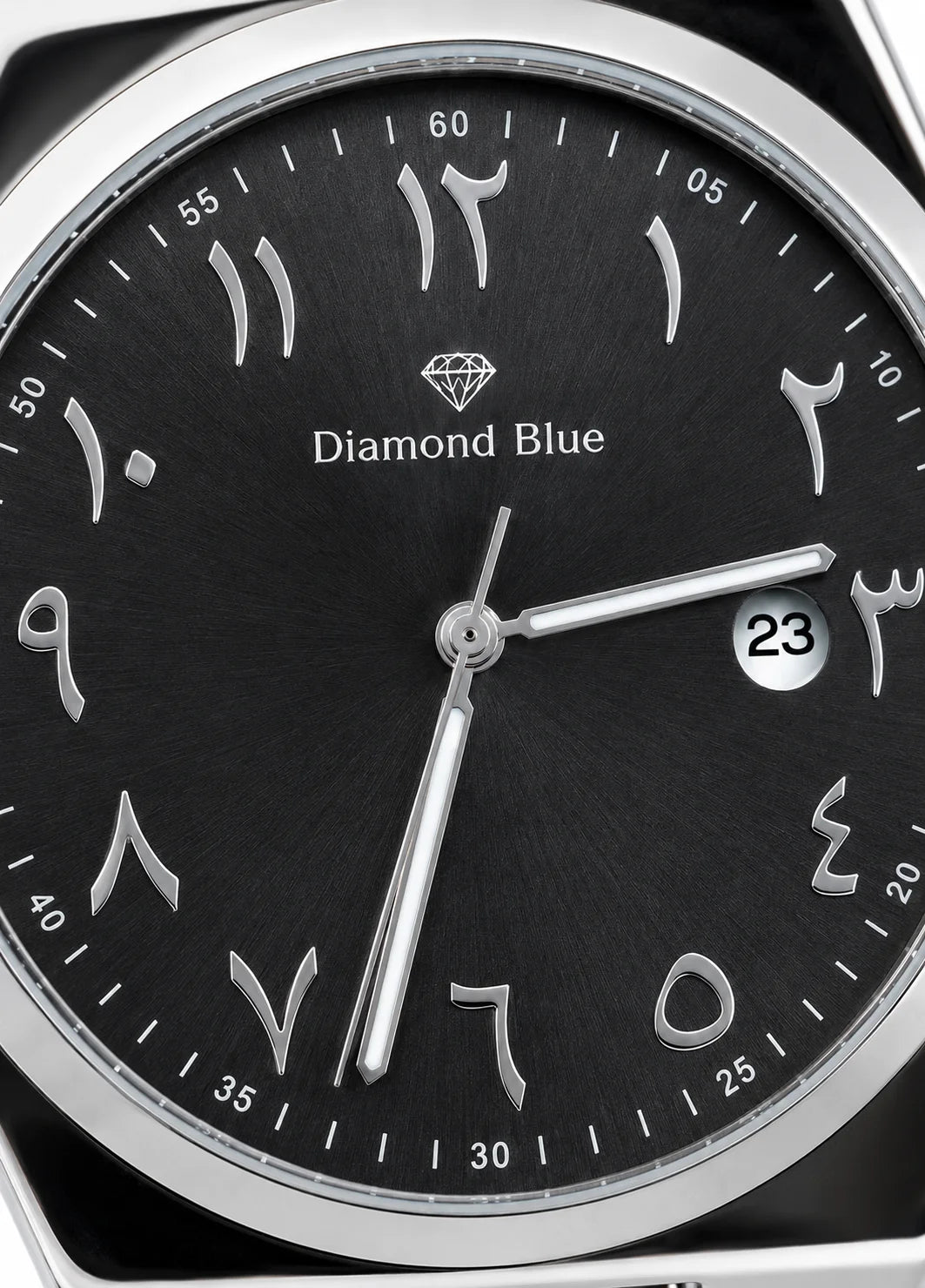 Close-up of Diamond Blue DB-013 black sunburst dial with silver Arabic numerals, silver hands, Diamond Blue logo and date display.