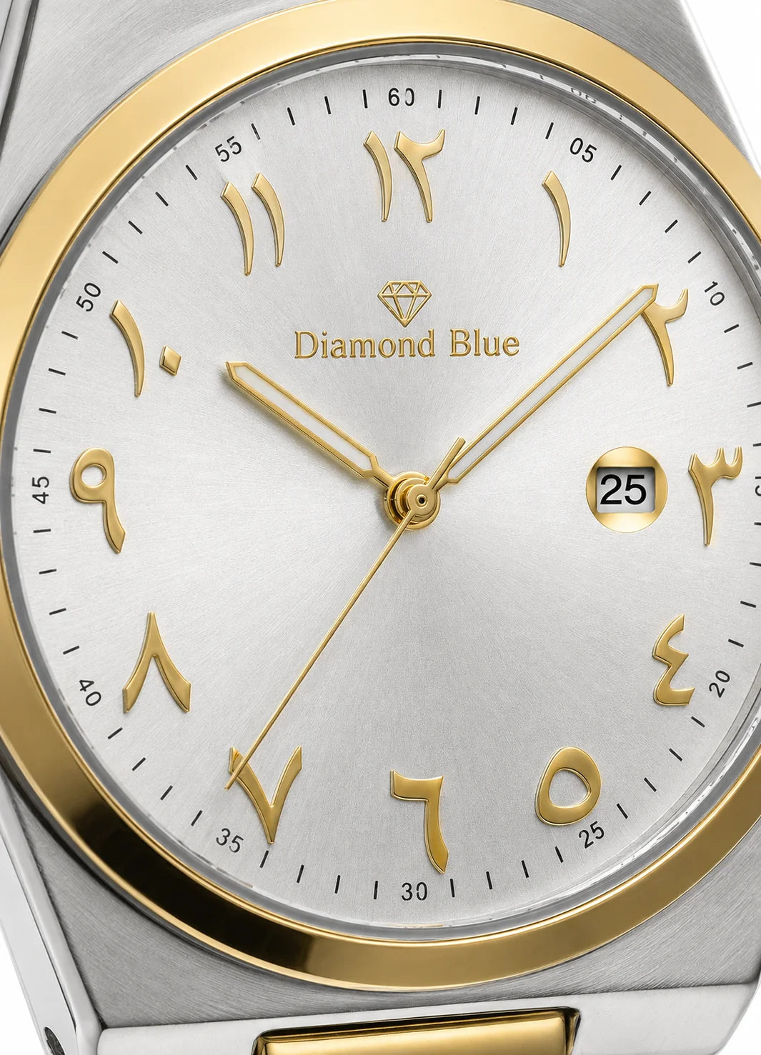 Close-up of Diamond Blue DB-015 silver sunray dial with gold Arabic numerals, gold hands, Diamond Blue logo and date display.