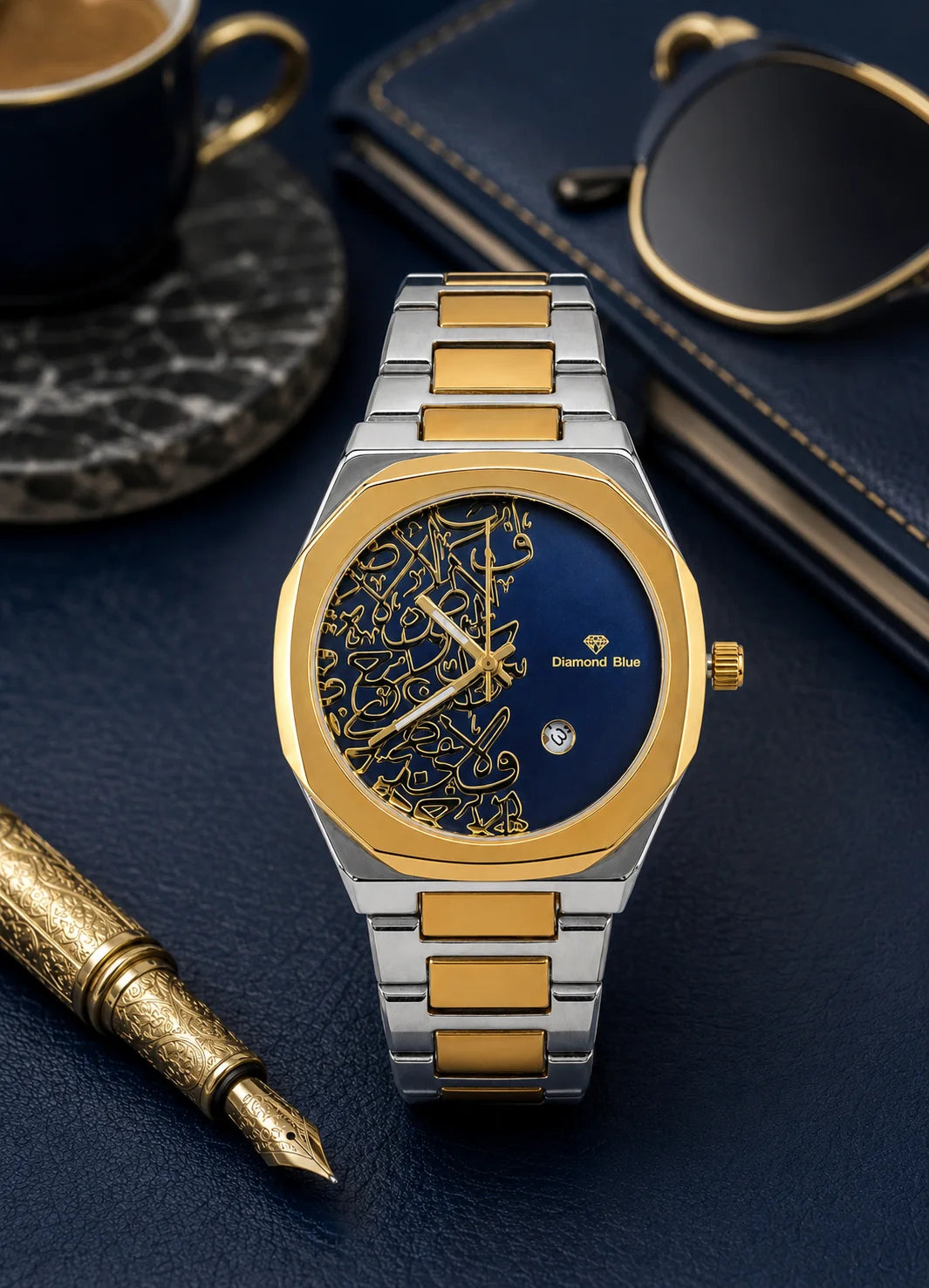 Diamond Blue DB-021 two-tone men's watch with blue Arabic calligraphy dial styled on a premium executive desk.