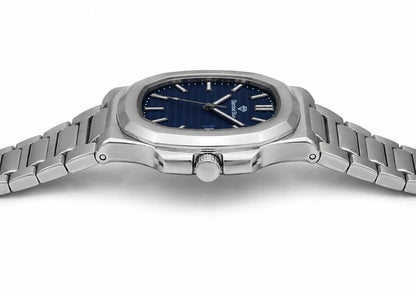 Three-quarter view of Diamond Blue DB-001 luxury stainless steel watch with blue textured dial.